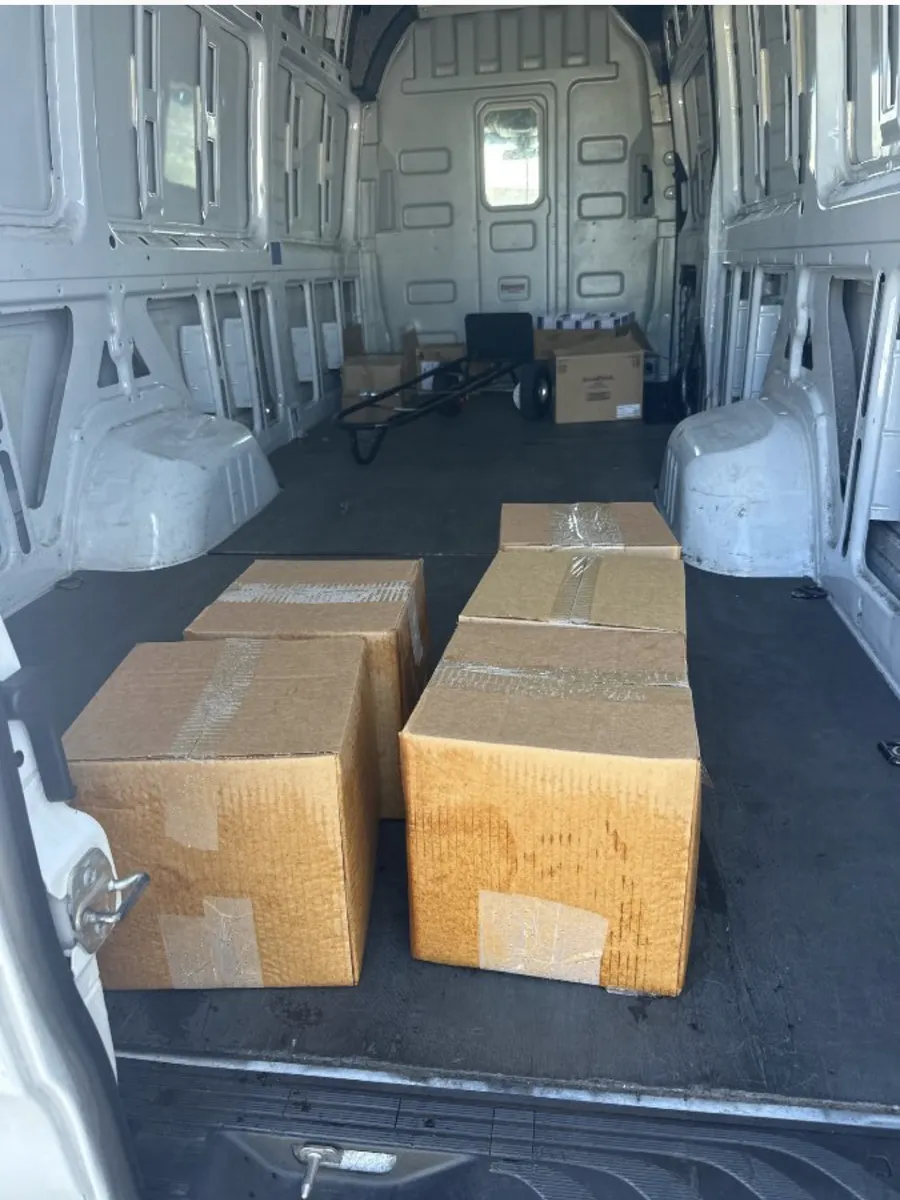 Boxes containing dry ice in a cargo van